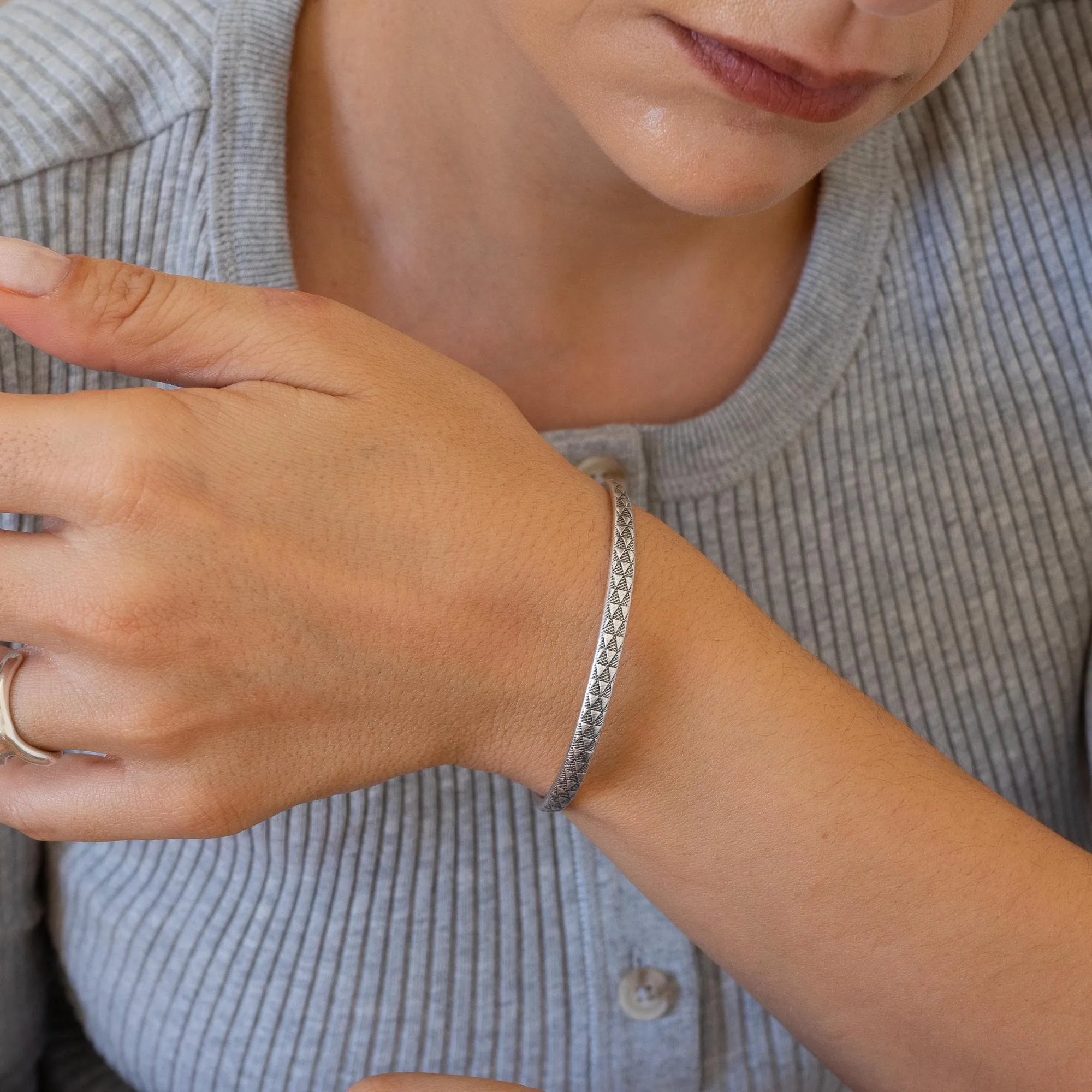Silver Hammered Bangle with Floral Pattern