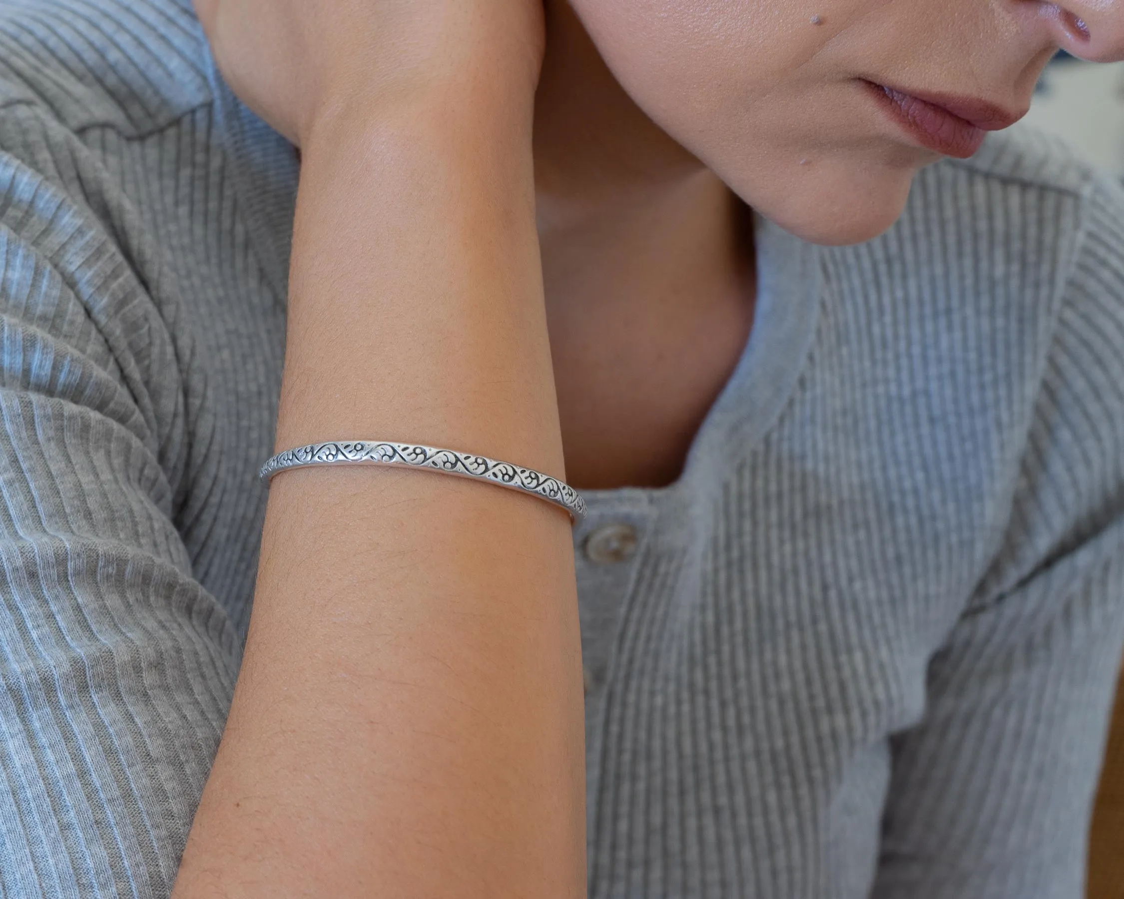 Silver Hammered Bangle with Floral Pattern
