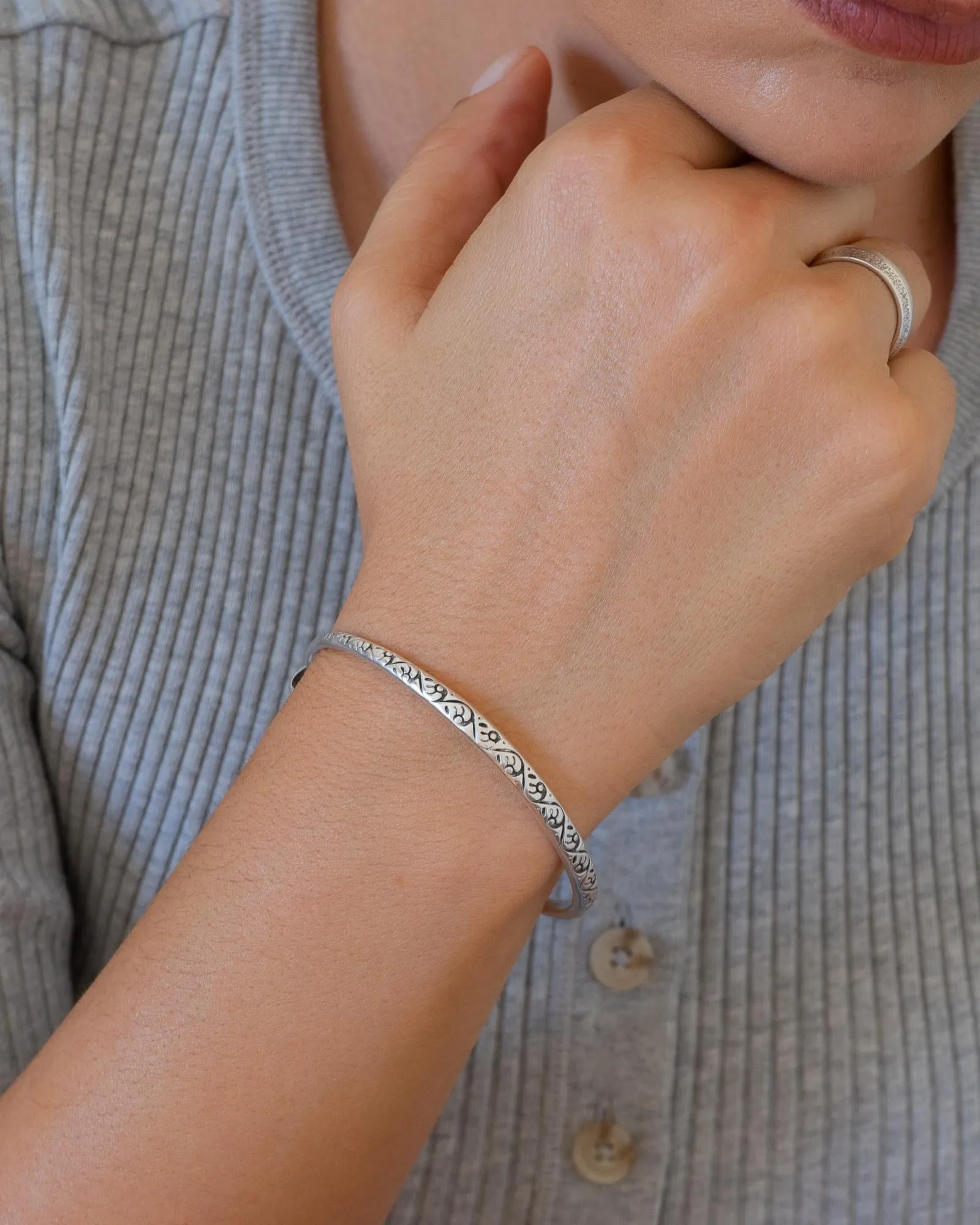 Silver Hammered Bangle with Floral Pattern