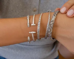 Silver Hammered Bangle with Floral Pattern