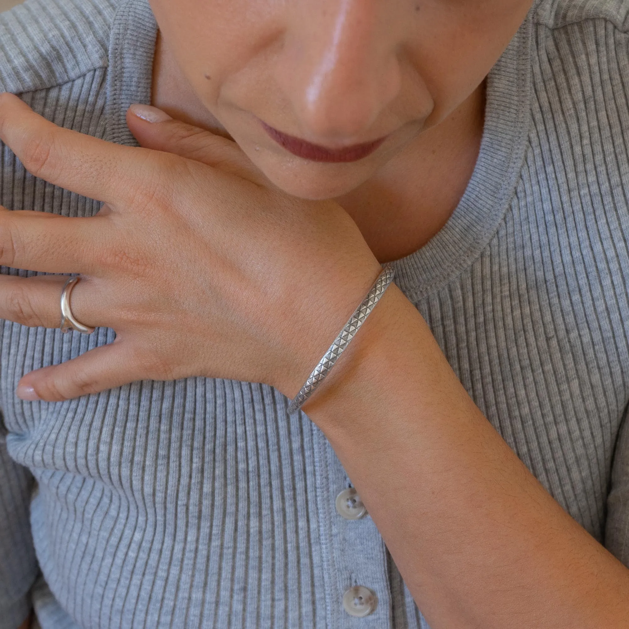 Silver Hammered Bangle with Floral Pattern