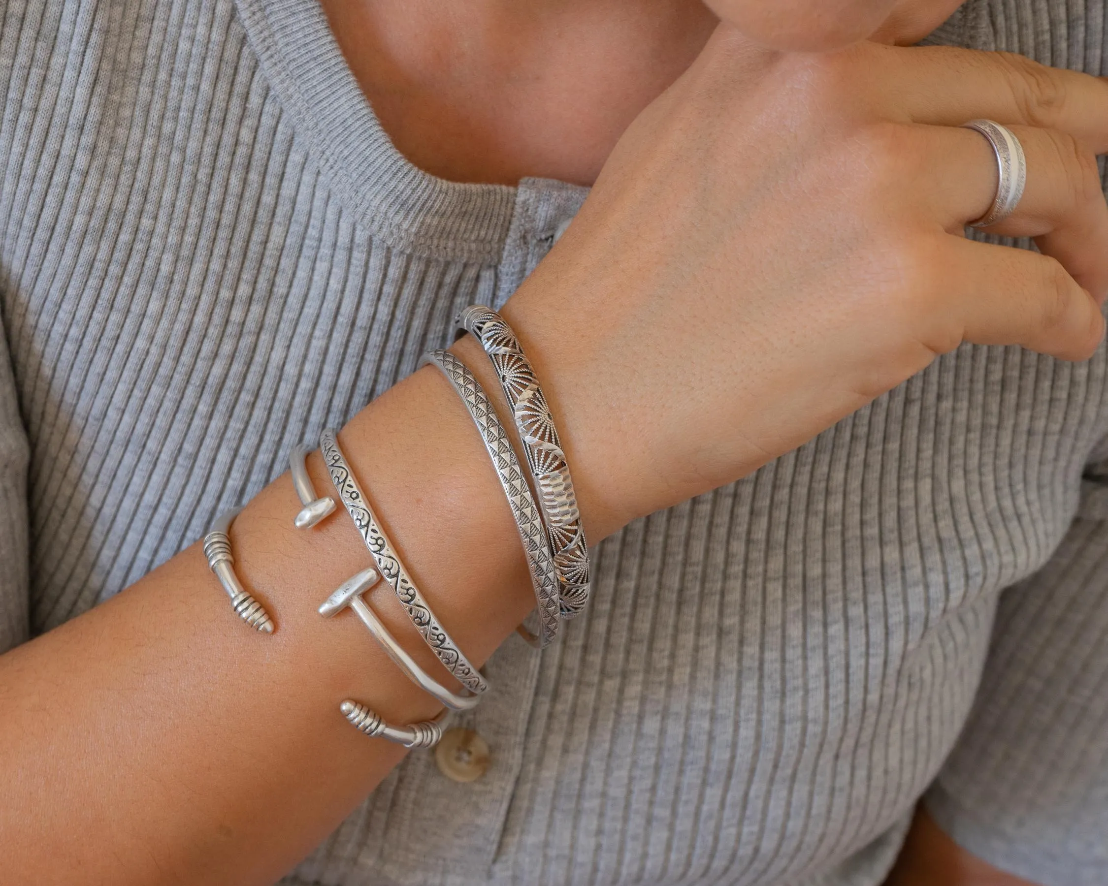 Silver Hammered Bangle with Floral Pattern
